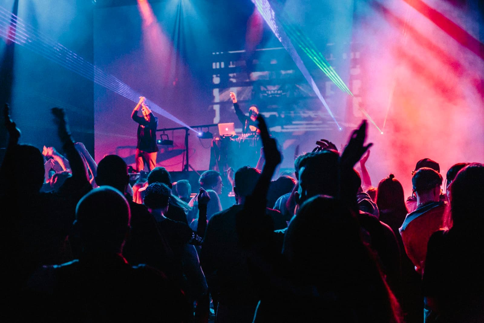 Stage lights cutting through haze